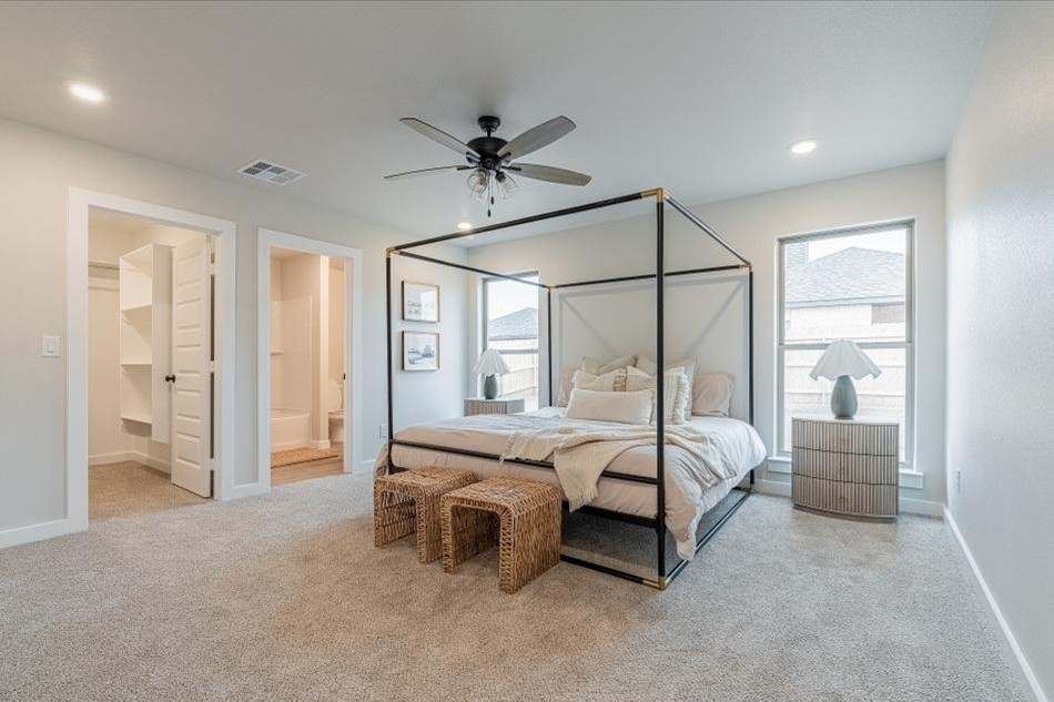 Kenlie Interior Comp Photo of a furnished master bedroom in the Kenlie, a Betenbough Homes floor plan.