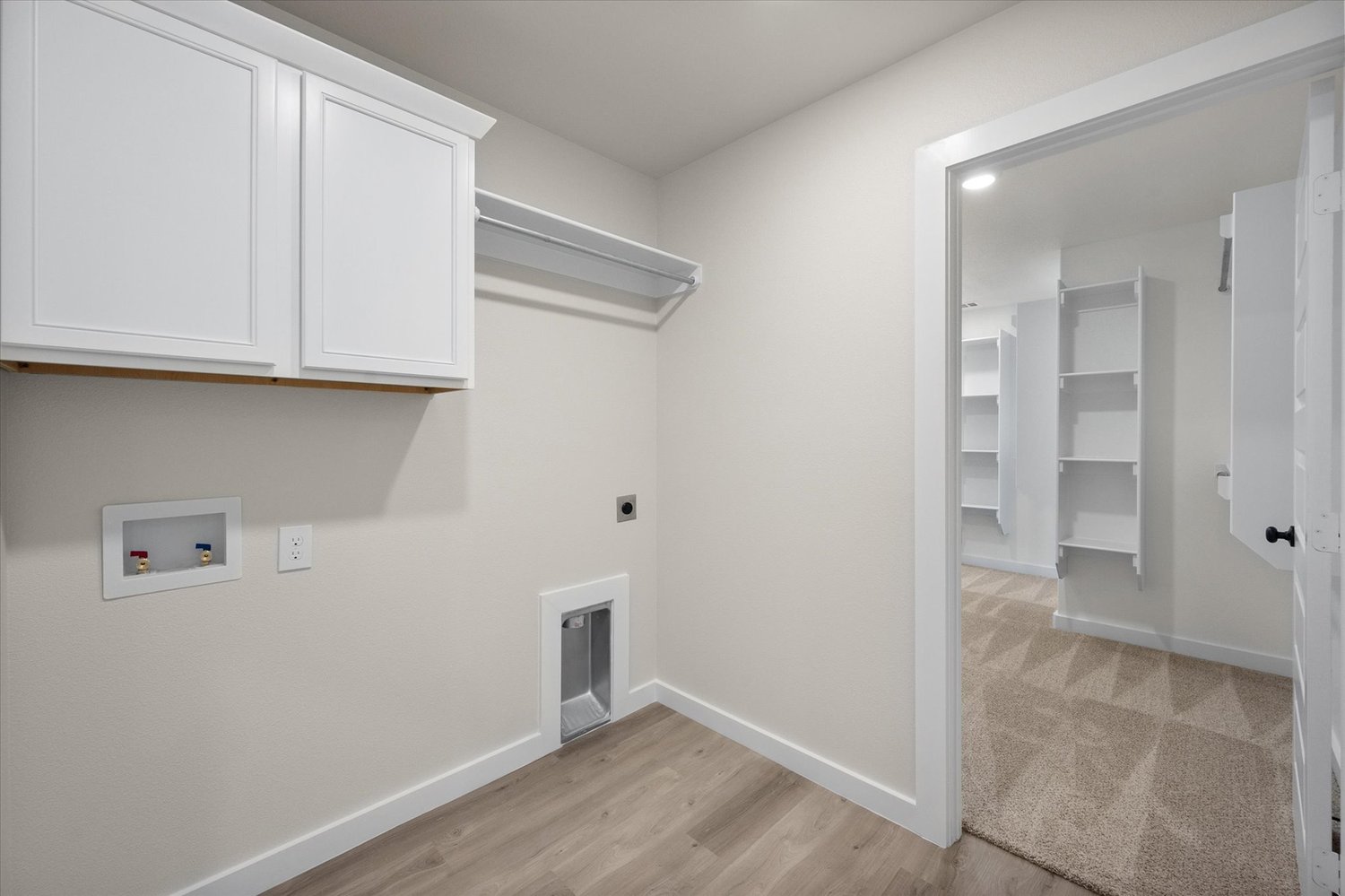 Photo of utility room in the Nikki, a Betenbough Homes floor plan.