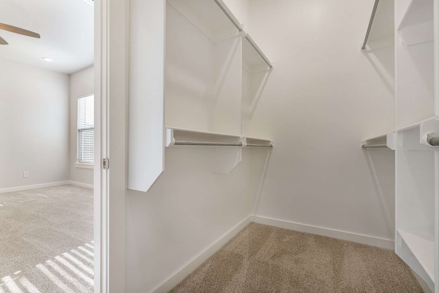 Photo of a walk-in closet in one of Betenbough's homes with walk-in closets, the Layla