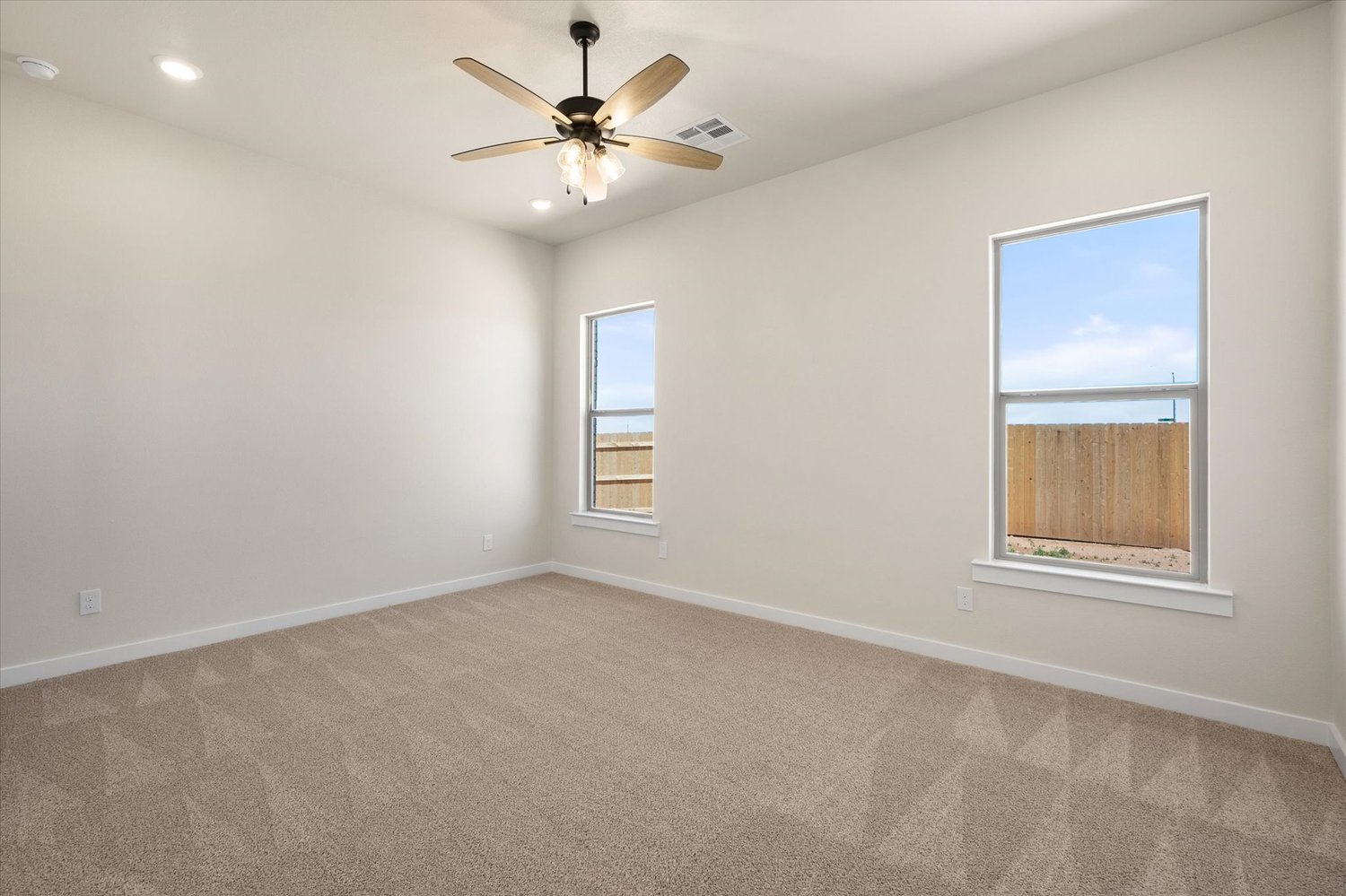 Photo of bedroom in the Nikki, one of Betenbough's homes with open floor plan.