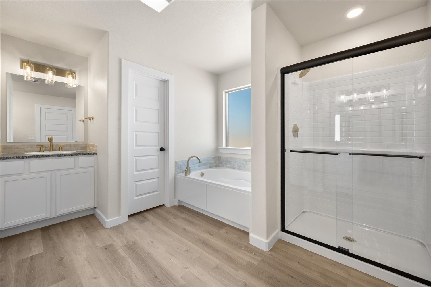 Photo of master bath in the Nikki, one of Betenbough's homes with open floor plan.