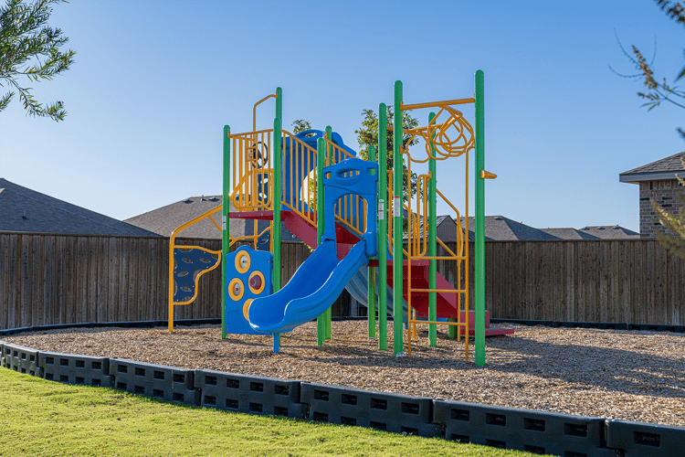 Photo of playground equipment at a pocket park in Bell Farms, a Betenbough Homes community in south Lubbock Tx.