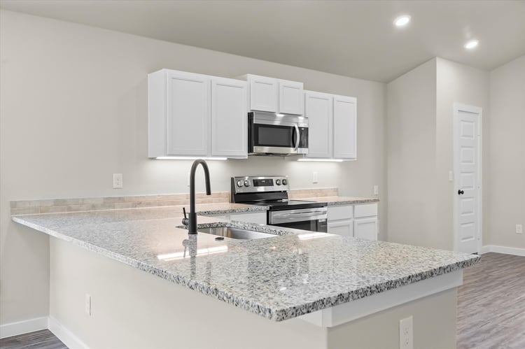 Photo of kitchen in the Dorris, a floor plan by Betenbough Homes, West Texas' #1 home builder.