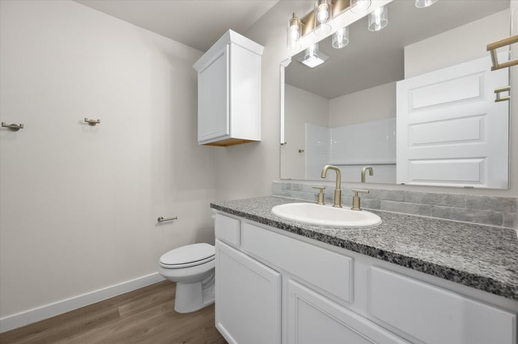 Photo of bathroom in the Nikki, one of Betenbough's homes with open floor plan.