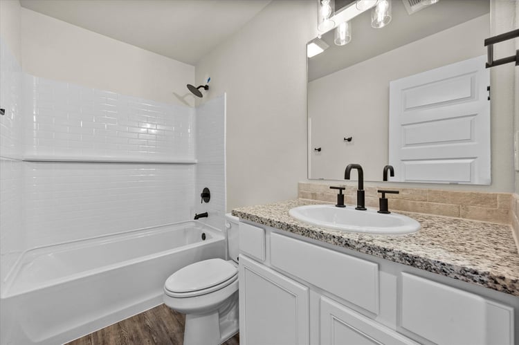 Photo of bathroom in the Dorris, one of Betenbough's homes with a walk-in closet.