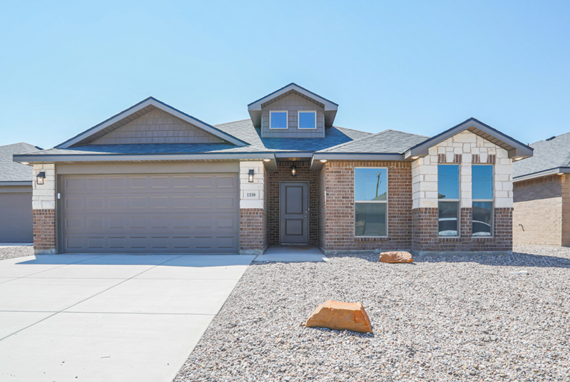 Photo of a Betenbough home exterior with xeriscape.