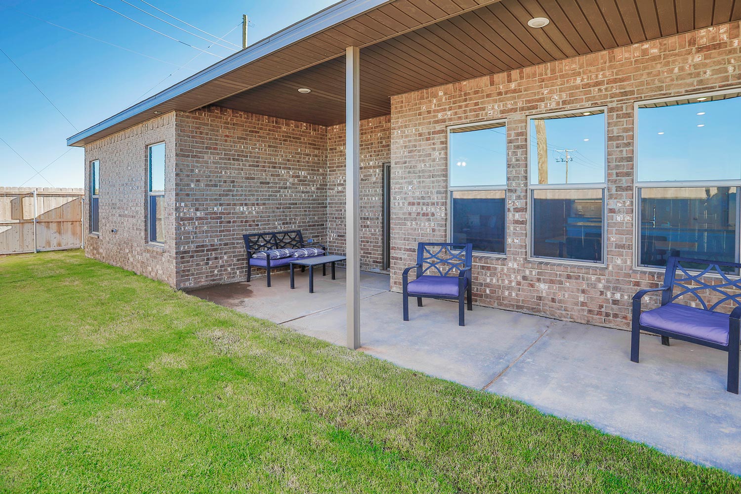 Photo of a furnished backyard of a Betenbough home.