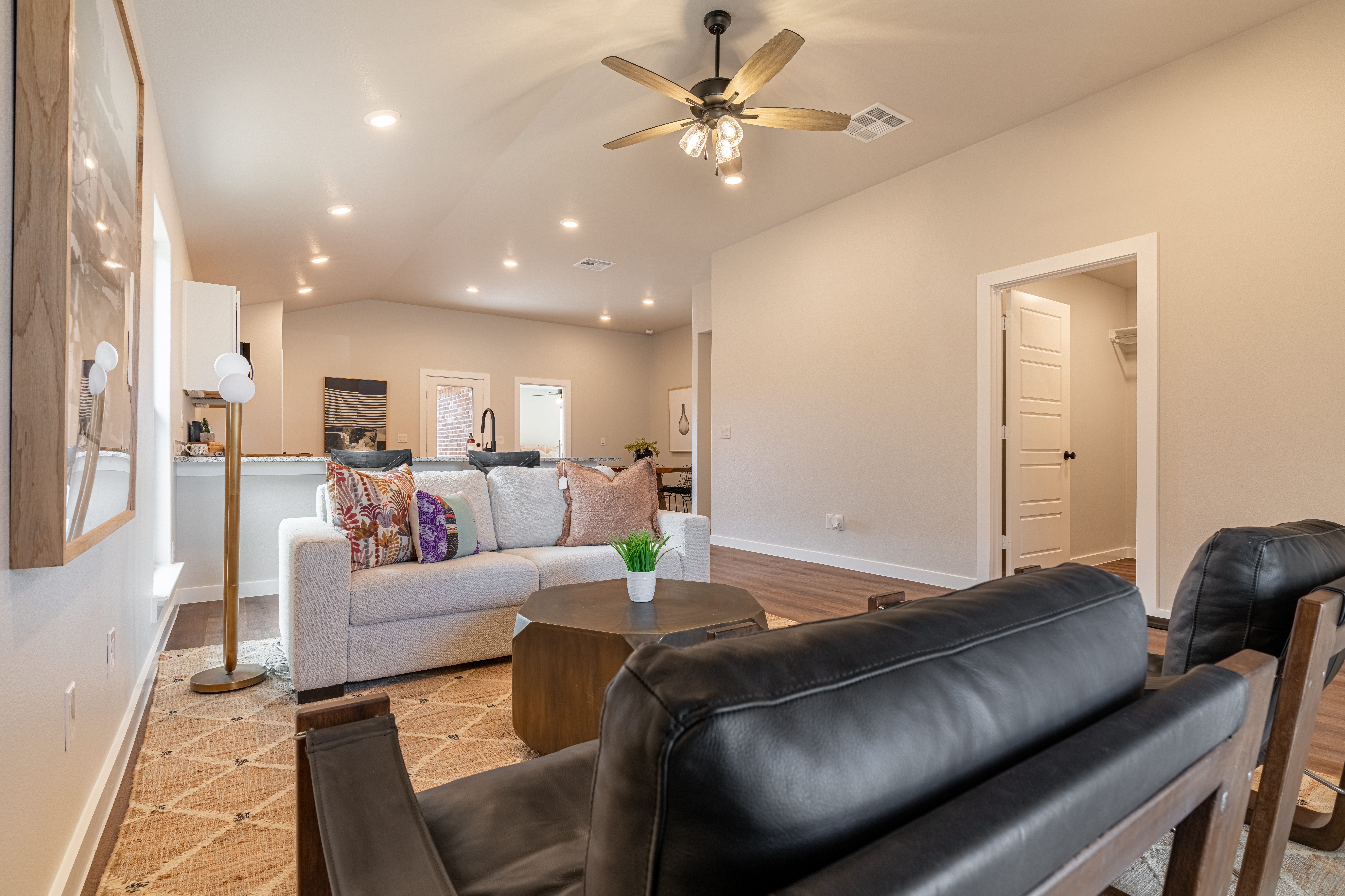 Photo of a ceiling fan with LED light fixture and recessed LED lighting in an energy-efficient home by Betenbough Homes, West Texas' #1 home builder.