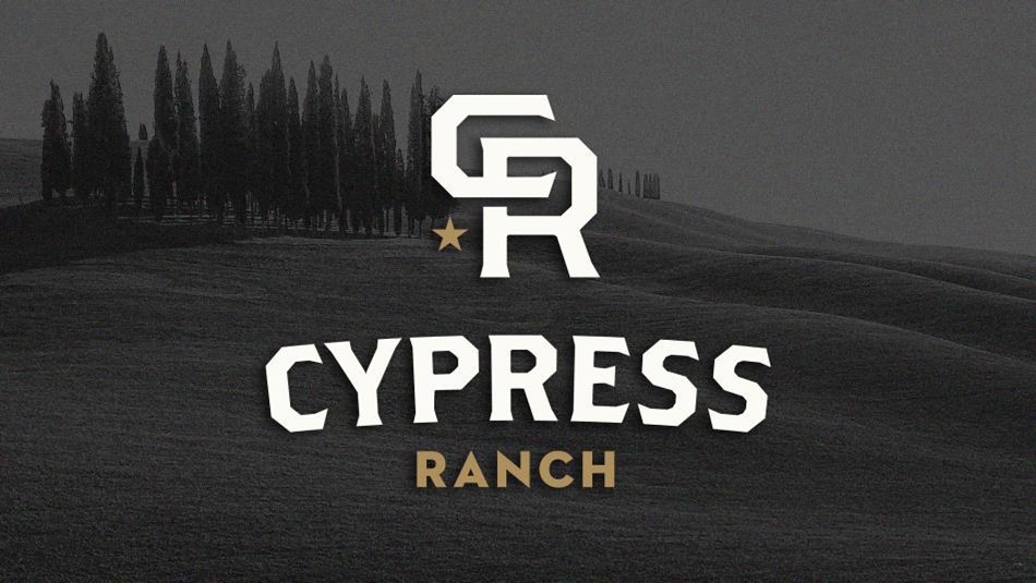 Image of Cypress trees on a hill. The logo for the Cypress Ranch new home community is over the image.