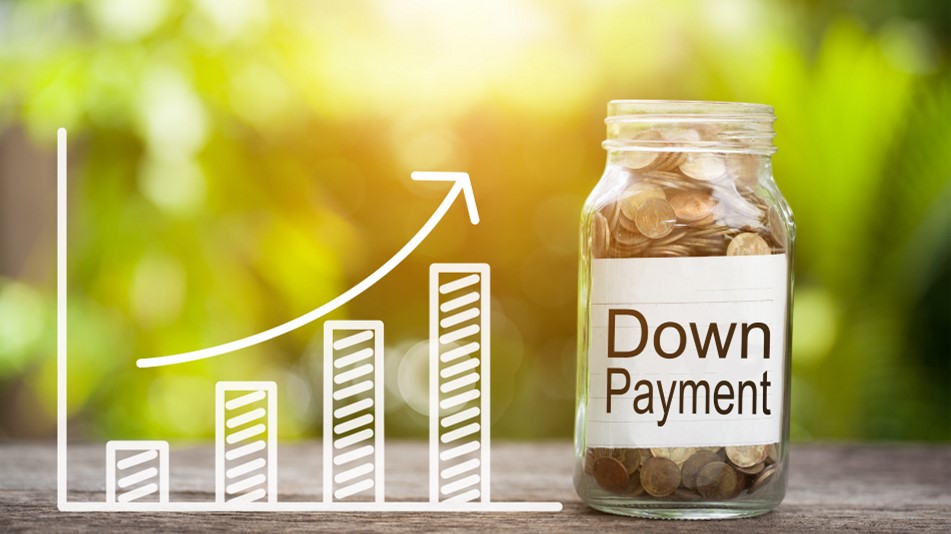 Photo of a jar of coins labeled 'Down Payment' next to a bar graph showing increase, representing saving for a down payment over time.