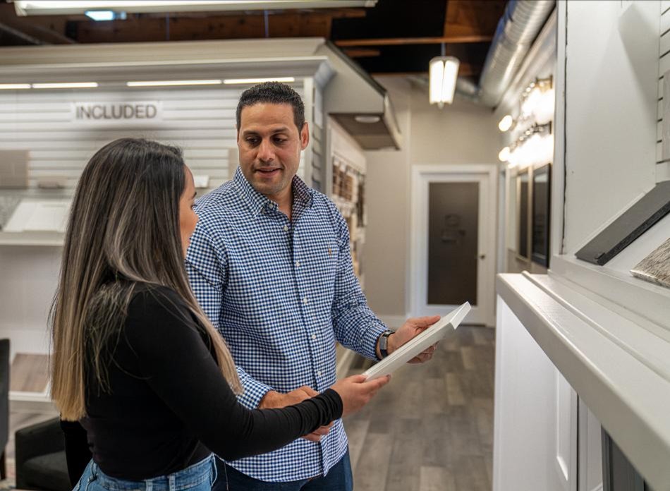 Photo of home buyers exploring options for their new Betenbough home.