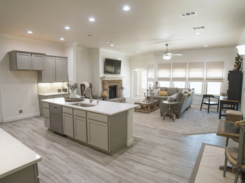 Photo of a furnished Betenbough home kitchen and living room.