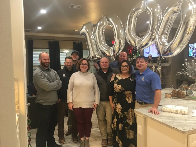 Photo of the Amarillo team celebrating 1,000 home closings in 2018.