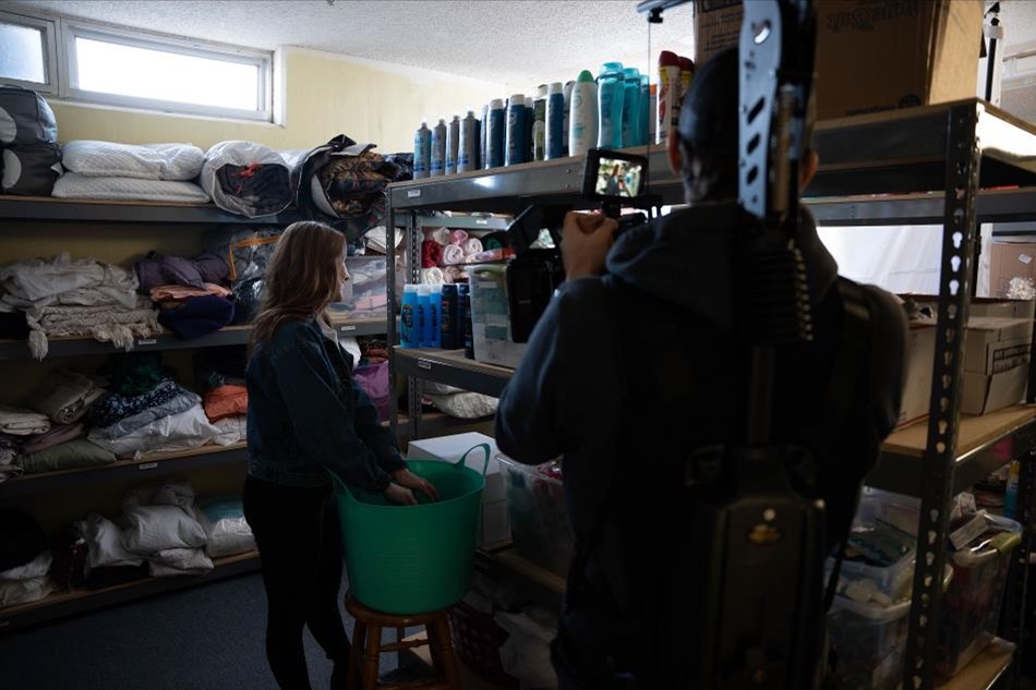 Photo of someone organizing a storage unit.